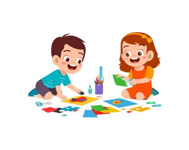 Küçük çocuk arkadaşlarıyla sanat için kağıt kesiyor.