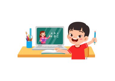 Küçük çocuk evde online eğitim alıyor.