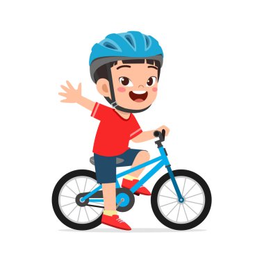 Küçük çocuk bisiklet sürüyor ve kask takıyor.