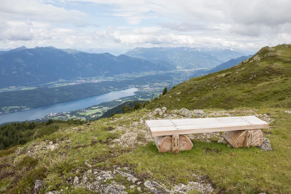 Bench on Alp Millstatt View Into The Valley And Lake Millstatt Royalty Free Stock Images