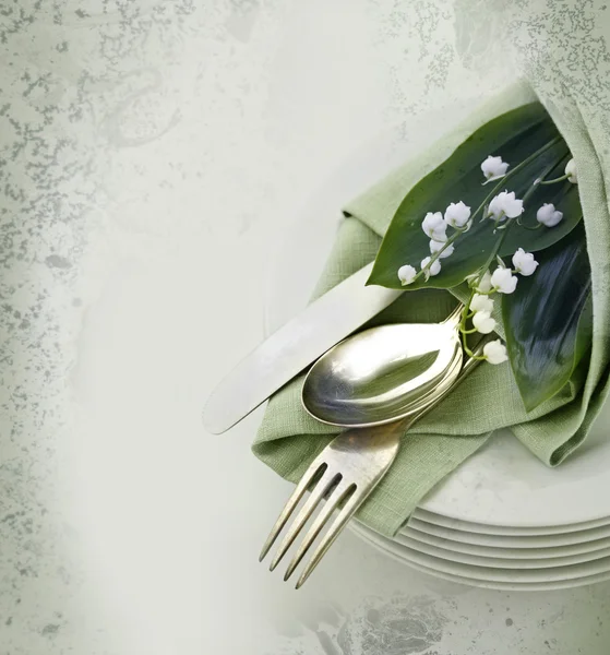 Tableware and Lily of the Valley — Stock Image Tableware and Lily of the Valley Stock Photo