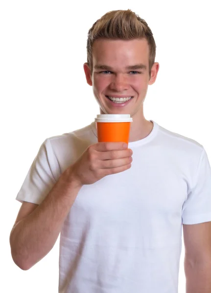 Young man drinking hot coffee — Stock Photo, Image