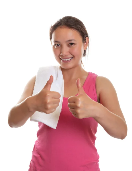 Sporty asian girl showing thumbs — Stock Photo, Image