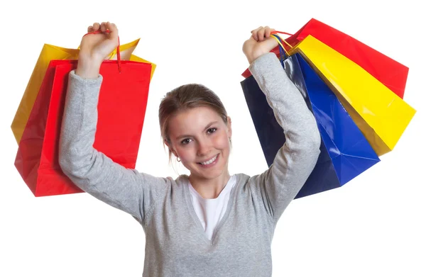 Laughing woman after shopping — Stock Photo, Image