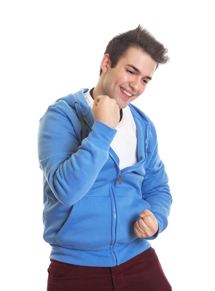 Jublande spansktalande kille i en blå tröja — Stockfoto