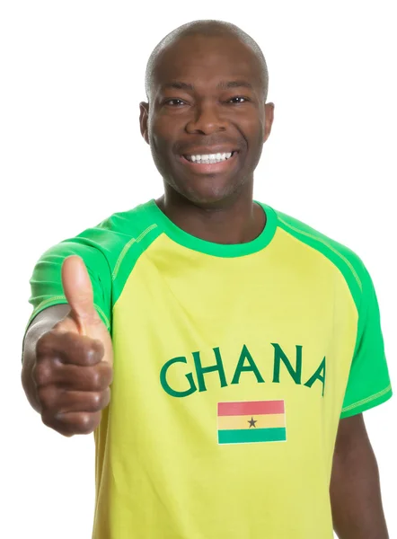 Sportfantast från ghana visar tummen — Stockfoto