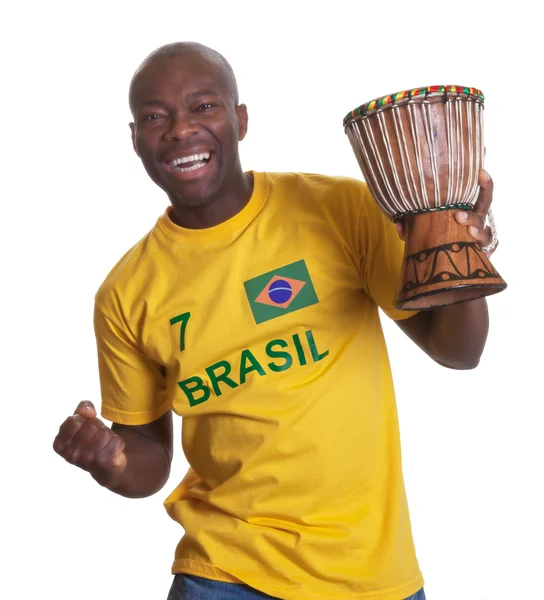 Killen från Brasilien med trumma är glad om sitt team — Stockfoto