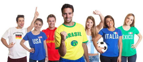 Ventilador de esportes rindo do Brasil com fãs de outros países — Fotografia de Stock