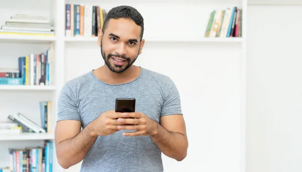 Handsome Hispanic Hipster Man Beard Sending Message Mobile Phone Indoors — Photo