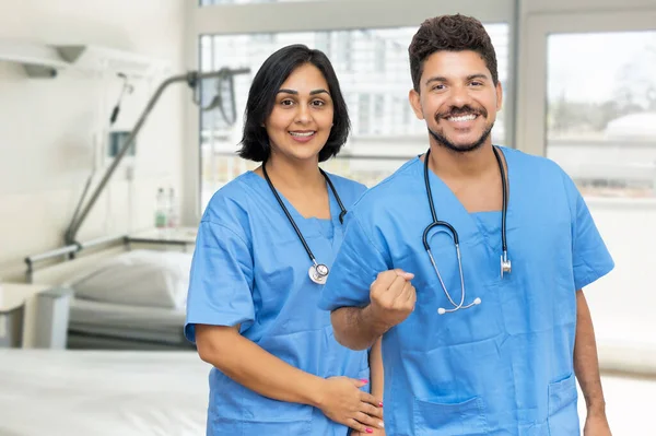 Motivated Hispanic Male Female Doctors — Stock fotografie