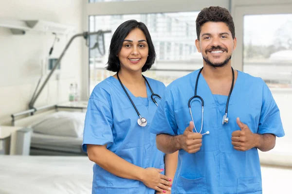 Cheerful Hispanic Male Female Doctors — 图库照片