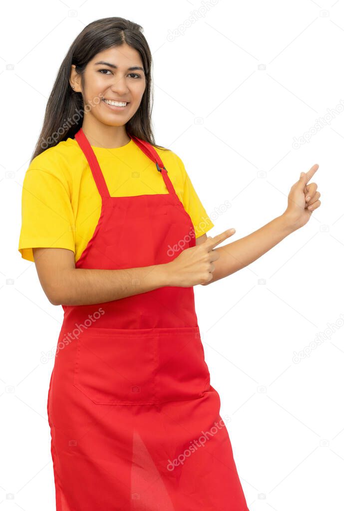 Friedly south american waitress pointing sideways isolated on white background for cut out