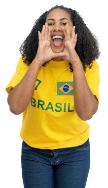Screaming brazilian female soccer fan isolated on white background for cut out