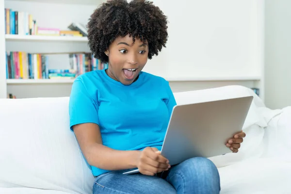 African American Young Adult Woman Streaming Movie Computer Indoors Home — Stockfoto