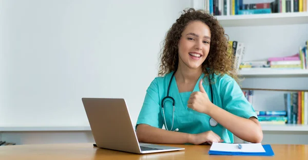 Motivated medical student or female nurse at work at hospital with copy space