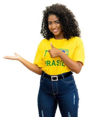 Young woman from Brazil loves football isolated on white background for cut out
