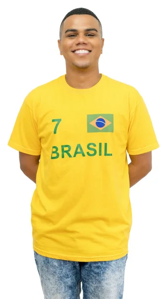 若いですブラジルのサッカーファンとともに黄色のジャージは白の背景に隔離されています — ストック写真