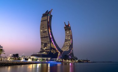 Lusail, Qatar- June 06, 2022: The crescent tower in the newly developing city lusail in Qatar.