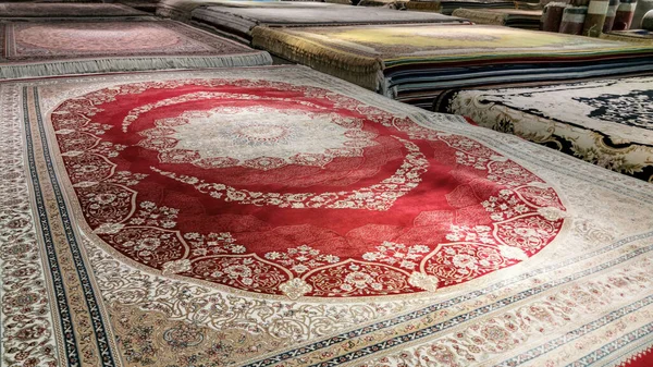 Many persian carpets at a carpet store in dubai.