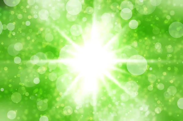 在绿色背景上的抽象恒星的光. — 图库照片