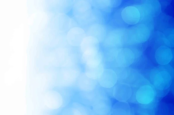 Light bokeh on blue background — Stock Photo, Image
