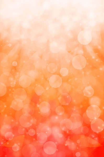 Abstract light bokeh on orange background. — Stock Photo, Image