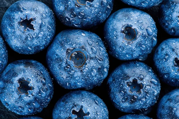 Fresh ripe blueberries with water drops. Macro photo. Berry background. — Stock Photo, Image