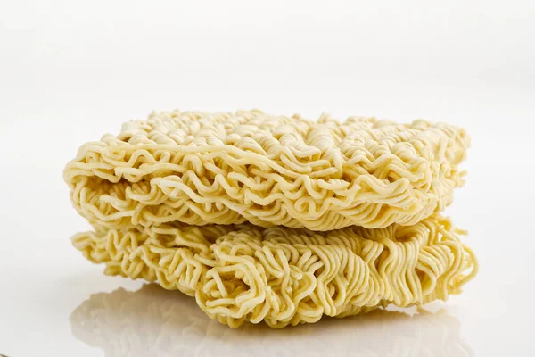 Fideos instantáneos crudos. Cerrar textura de fideos instantáneos para el fondo. —  Fotos de Stock