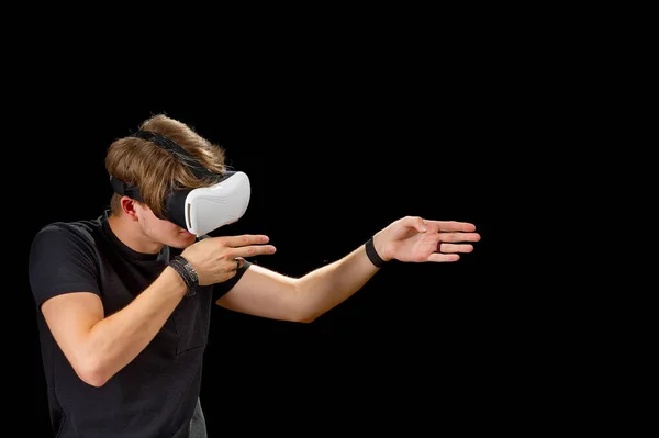 Young Man Wearing Virtual Reality Glasses Goggles Isolated Black Background — Zdjęcie stockowe