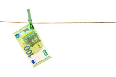 Euro banknotes hanging on a clothesline against white background. Euro money on rope isolated on white background. Money laundering concept