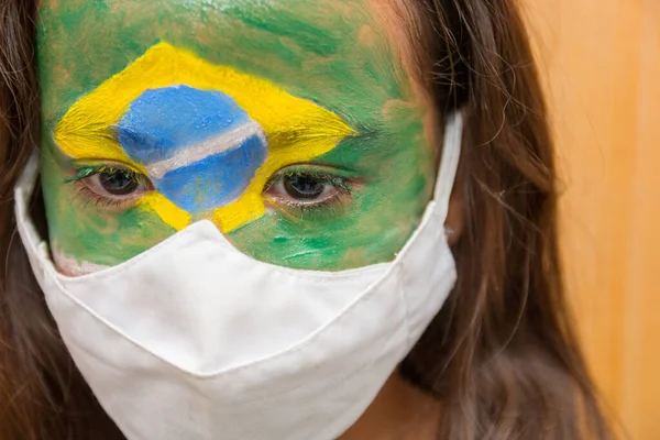 Niño Con Una Máscara Con Cara Pintada Con Bandera Brasil —  Fotos de Stock