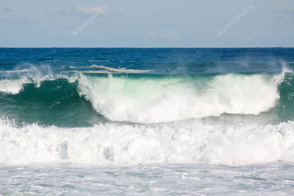 waves crashing on leblon beach in rio de Janeiro Brazil.