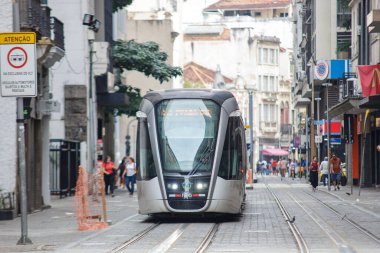 vlt train in downtown Rio de Janeiro, Brazil - July 16, 2022: tram train along september seven street in downtown Rio de Janeiro.