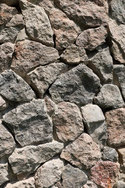 Textura de uma parede de pedra de fundo — Fotografia de Stock