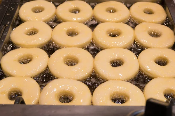 Frying croissant doughnut pastry (Cronut) — Stock Photo, Image
