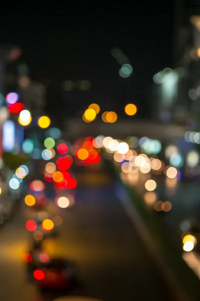 Abstrato Blur tráfego e luzes do carro bokeh no fundo hora de ponta — Fotografia de Stock
