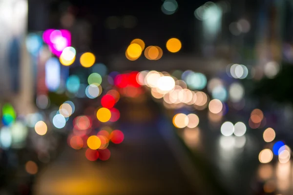 Abstract vervagen verkeer en auto lichten bokeh in spitsuur achtergrond — Stockfoto