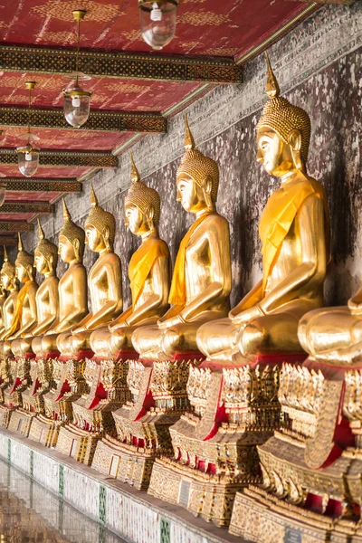 Golden buddha at Wat Suthat Thepphawararam is a royal temple in Bangkok, Thailand — стоковое фото