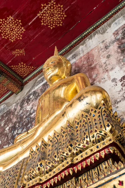 Golden buddha at Wat Suthat Thepphawararam is a royal temple in Bangkok, Thailand — стоковое фото