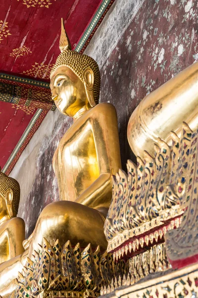 Golden buddha at Wat Suthat Thepphawararam is a royal temple in Bangkok, Thailand — стоковое фото