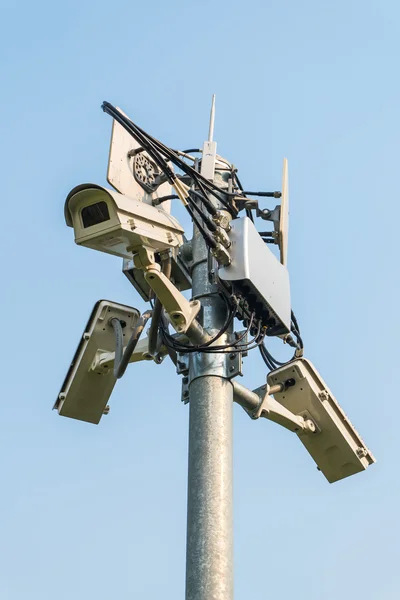 Security Camera CCTV in blue sky — Stock Photo, Image