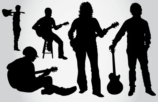 Guitarist silhouettes — Stock Vector