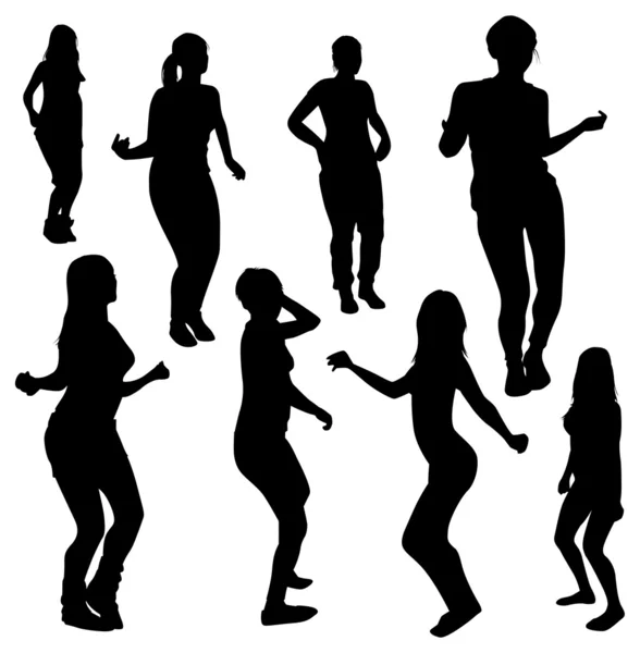 Dansende meisjes silhouetten — Stockvector