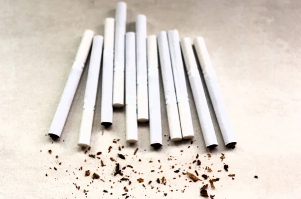 Cigarettes Lie Table Tobacco Crumbs — Stock Photo, Image