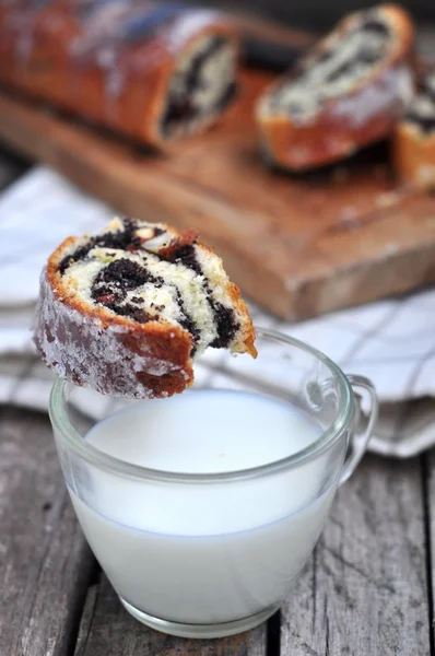 Poppy seed roll with milk — Stock Photo, Image