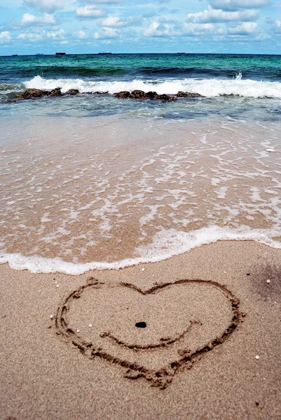 Hand written on sand beach — Stock Photo, Image