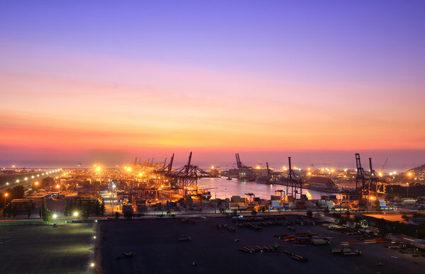 container terminal at dusk