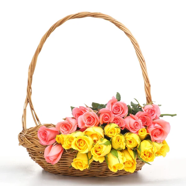 Beautiful rose in wooden basket — Stock Photo, Image