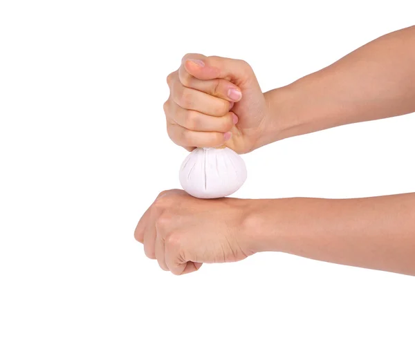 Massage hand with herbal compress balls with clipping path — Stock Photo, Image