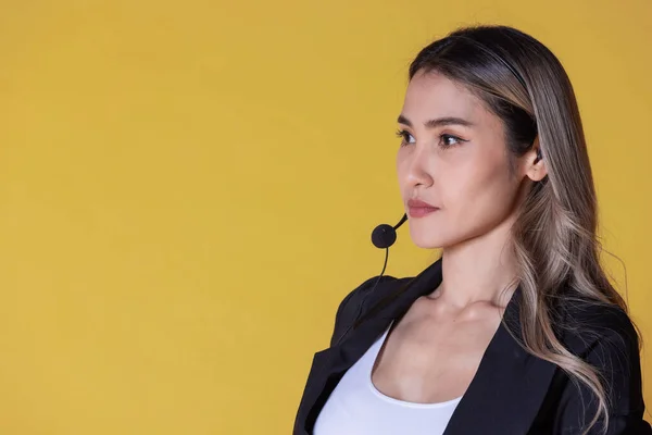 stock image attractive young woman talking on headset